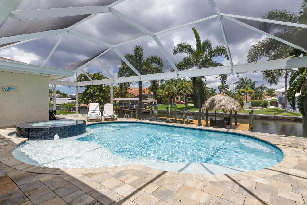 Half mile to the beach! Heated Pool & Spa, with Tiki on boat dock! - Villa Changes in Attitude